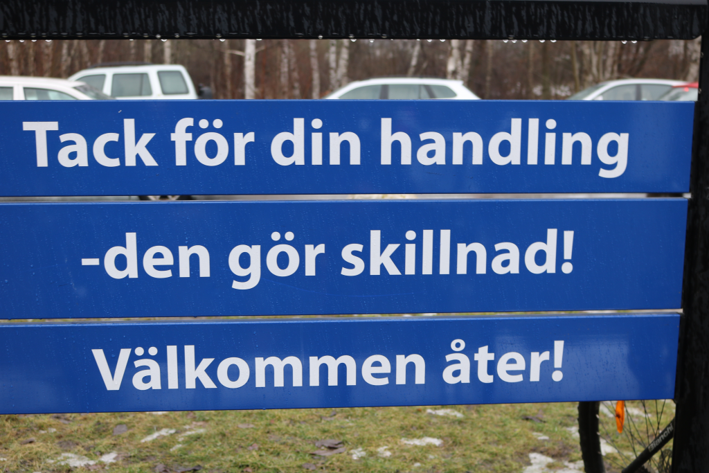 Välkommen åter-skylt