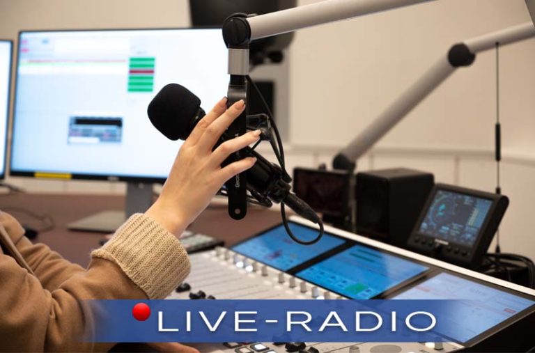 Live Radio. Hand på mick