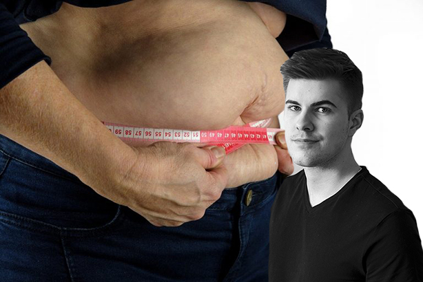 Bild på en stor mage och måttband runt om midjan.